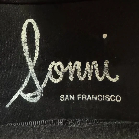 Vtg.Sonni 100% wool felt wide brim hat with faux fur and sequins.One Size